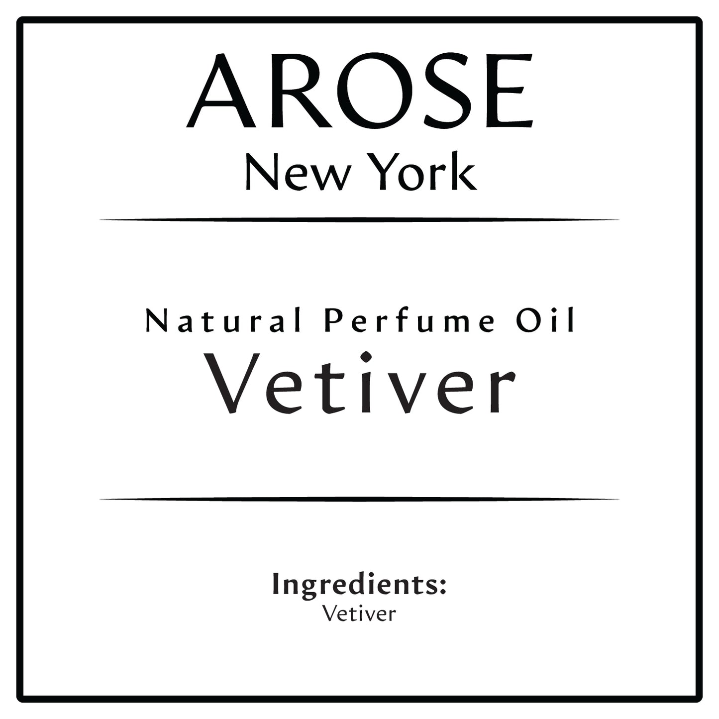 10ml roll-on bottle of Arose NY Vetiver Perfume Oil styled with vetiver roots and greenery – fresh, earthy, unisex scent in alcohol-free formula.